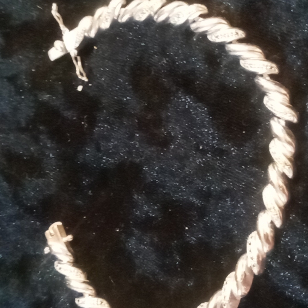Diamond allure bracelet pure silver over bronze. 8 inch .